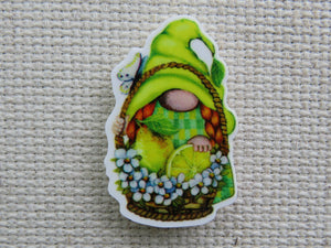 First view of Green gnome with white flowers and a couple of lemons minder.