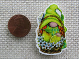 Second view of Green gnome with white flowers and a couple of lemons minder.