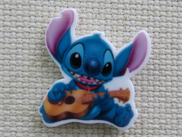 First view of Stitch and A Guitar Needle Minder.