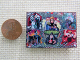 Second view of Maleficent, Ursula, The Evil Queen in both her characters, The Queen of Hearts and Cruella make up this montage of Disney Villains needle minder.