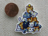 Second view of Kittens piled up on each other to form a Christmas tree of cats needle minder.