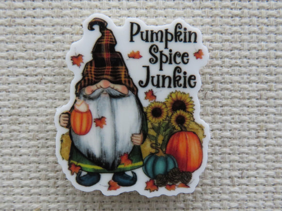 First view of Festive fall gnome with sunflowers, pumpkins and his favorite pumpkin spice drink in a pumpkin mug needle minder.