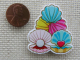Second view of Colorful Clam Shells Needle Minder.