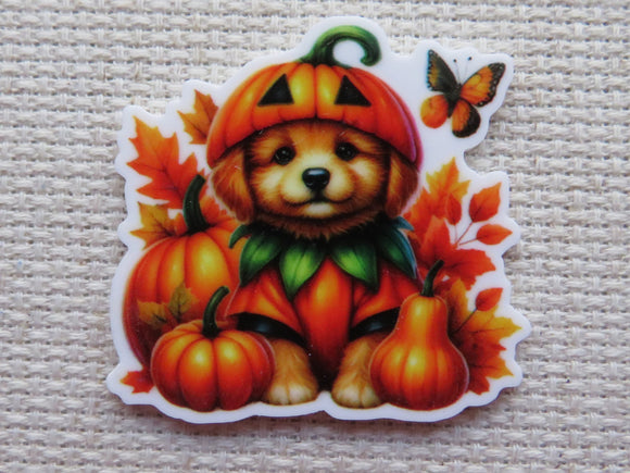 First view of Puppy with a Butterfly Pumpkin Fun Needle Minder.