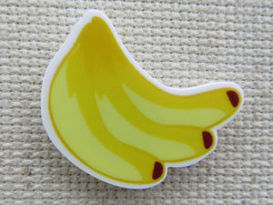 First view of a banana needle minder.