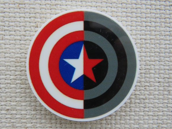 First view of Two colored Captain America Shield Needle Minder.