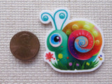 Second view of Colorful Snail Needle Minder.