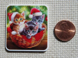 Second view of three Christmas cats in a basket minder.
