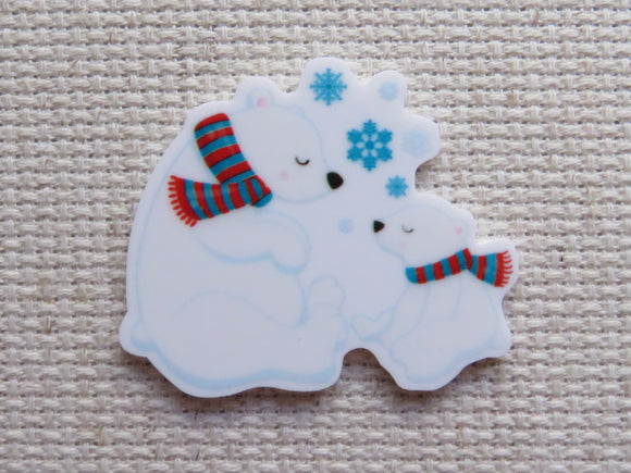 First view of Mother and child polar bears with scarves and snowflakes minder.