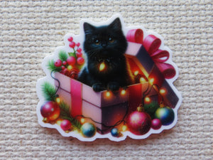 First view of Black Cat in a Christmas Box Needle Minder.