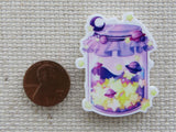Second view of A Jar of Stars and Planets Needle Minder.