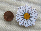 Second view of white daisy needle minder.