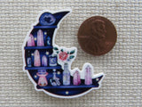 Second view of A Potion Moon Needle Minder.