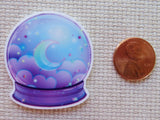 Second view of A Moon in a Globe Needle Minder.