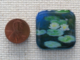 Second view of 2 Water Lily Painting Domed Needle Minder.
