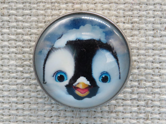 First view of Cute penguin face in a domed minder.