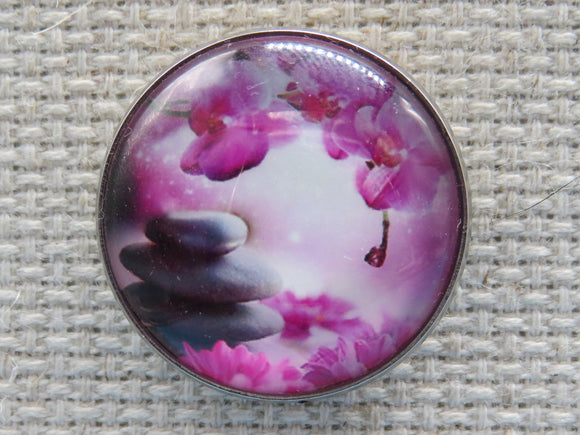 First view of Pink Orchids and Stones Domed Needle Minder.