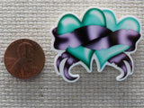 Second view of A Pair of Teal Hearts Needle Minder.