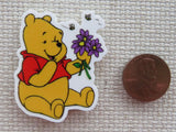Second view of Pooh Bear with Purple Flowers Needle Minder.