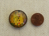 Second view of The Kiss Domed Needle Minder.