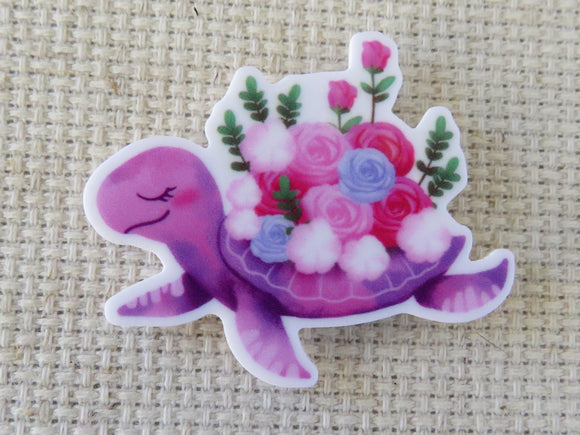 First view of Pink Flowery Turtle Needle Minder.