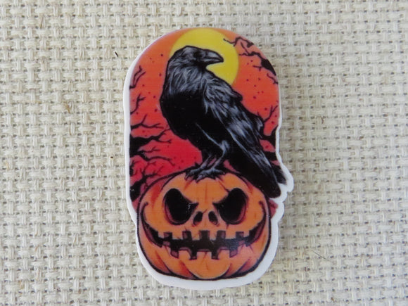 First view of Raven on a Pumpkin Needle Minder.
