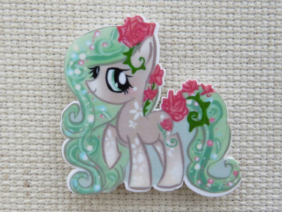 First view of Green Pony with Roses Needle Minder.