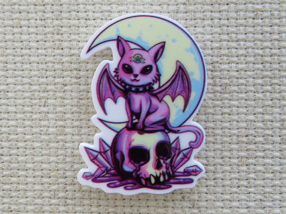 First view of Purple Bat Cat on a Skull Needle Minder.