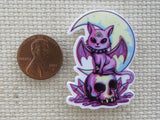 Second view of Purple Bat Cat on a Skull Needle Minder.