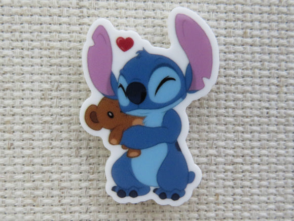 First view of Stitch Hugging a Teddy Bear Needle Minder.