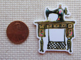 Second view of Treadle Black Sewing Machine Needle Minder.