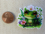 Second view of Cute green frog with pink flowers minder.