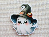 First view of Cute ghost wearing a black witches hat with a tiny carved pumpkin on the brim minder.