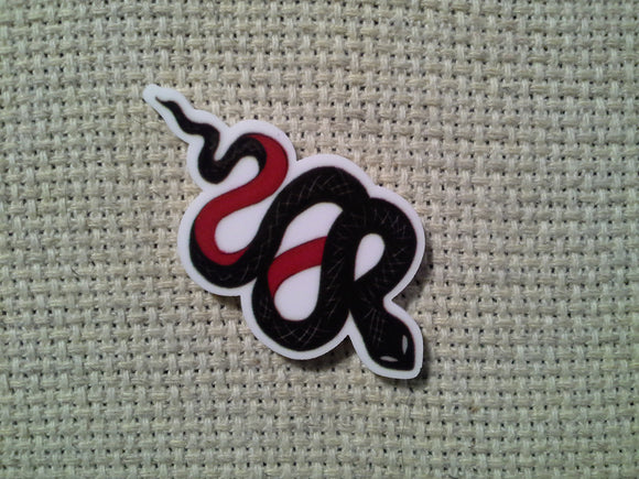 First view of the Red Snake Needle Minder