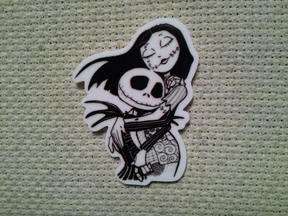 First view of the Black and White Jack and Sally Embrace Needle Minder