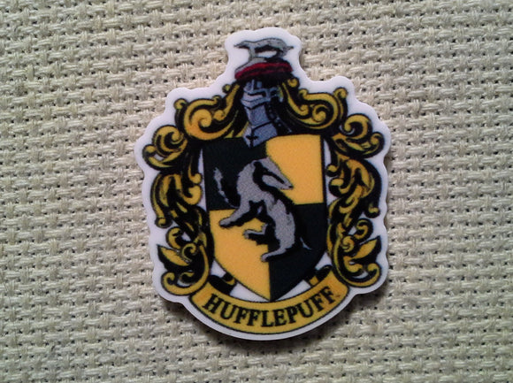 First view of the Hufflepuff House Crest with Badger Needle Minder