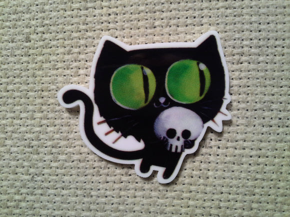 First view of the Green Eyed Black cat Carrying a Skull Needle Minder