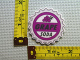 Third view of the Grape Soda Bottlecap Needle Minder