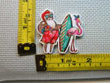 Third view of the Surfing Santa with a Flamingo Needle Minder