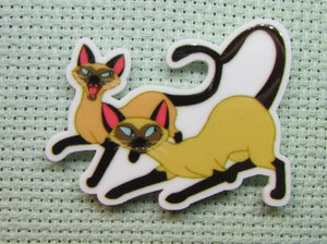 First view of the Siamese Cats Needle Minder