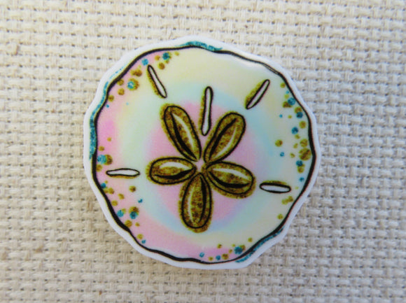 First view of sand dollar needle minder.