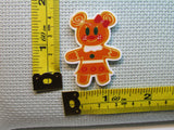 Third view of the Mickey and Minnie Gingerbread Boy and Girl Needle Minder