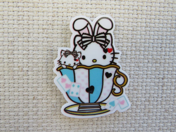 First view of Cute White Kitty in a Teacup Needle Minder.