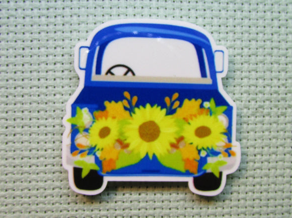 First view of the Blue Truck with Beautiful Sunflowers Needle Minder