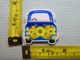 Third view of the Blue Truck with Beautiful Sunflowers Needle Minder