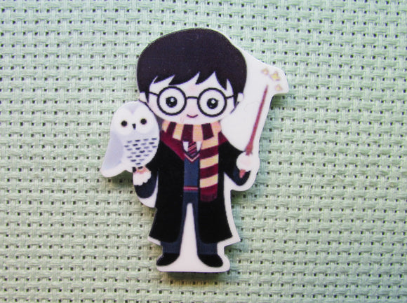 First view of the Wizard Boy with His White Owl Needle Minder