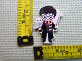 Third view of the Wizard Boy with His White Owl Needle Minder