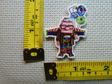 Third view of the Carl Dressed as Buzz Lightyear Needle Minder