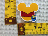 Third view of the Pooh Mouse Head Needle Minder