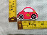 Third view of the Red Bug Car Needle Minder
